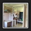 Desktop beside robe.