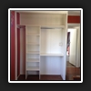 Desk inside robe.