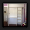 Desk inside robe.
