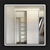 Long Hanging and shelving unit on left side.