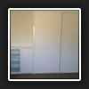 Client required a hinged door cabinet beside the robe for their tv and accessories.