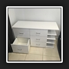 We had previously done other works for this client and they asked if we could custom build a side unit with filing cabinet built in.