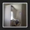 Queen14(3) - Finished Product with 1 x White Panel Door & 1 x Mirror Door in white frame.