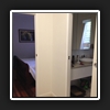 WIR10(3) - View of cavity sliding door and hinged door. BBIW needed to make custom drawers to suit the walls.