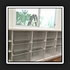 WIR12(3)- Wall 2 Internals. Includes baskets, shelving on end, and benchtop under window.