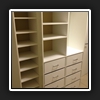 WIR25(6) - Moire shoe shelves and lots of drawers. There is even a makeup station with a mirror on the top of the second set of drawers.